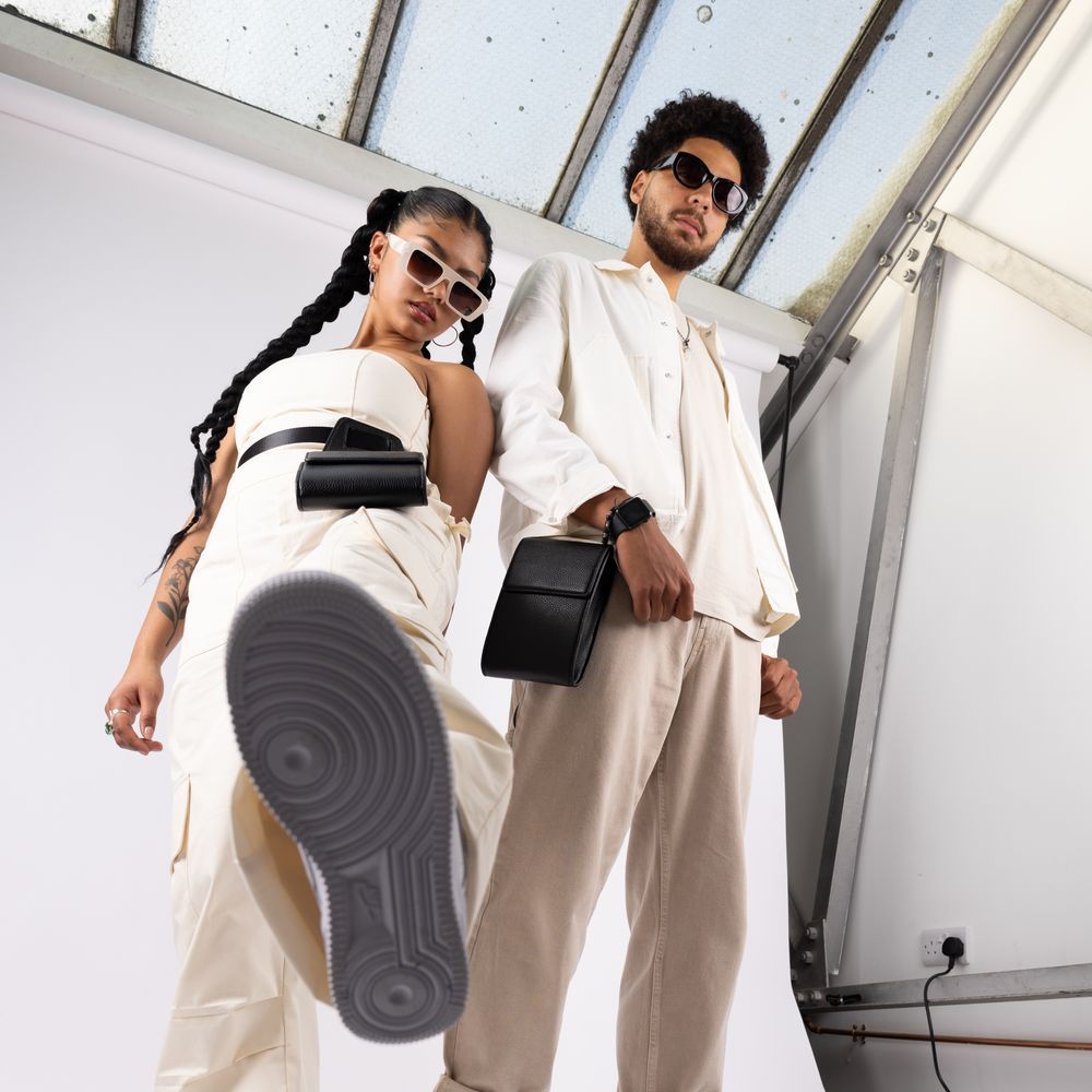 Two models shot on a white cove in the No Name Digital studios, North London