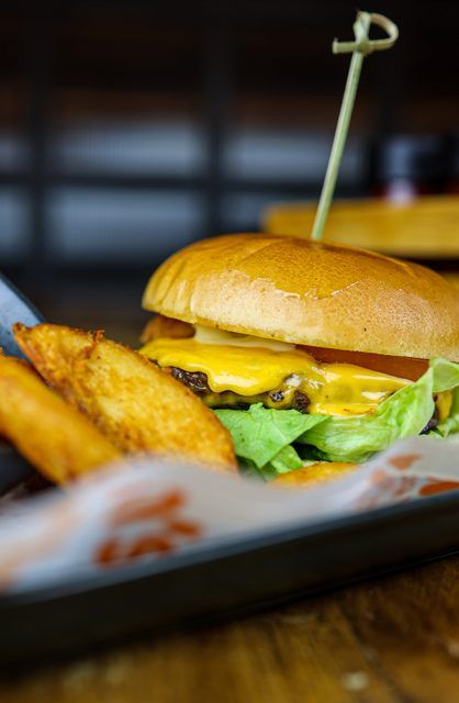 Food photography of a burger and fries for a restaurant client